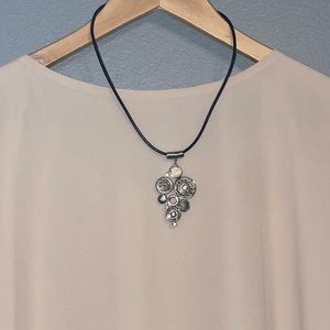 Black and silver necklace with hints of silver and mother of pearl